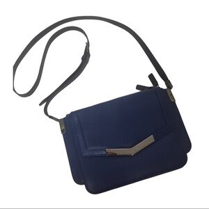 Time’s Arrow Leather Crossbody Bag